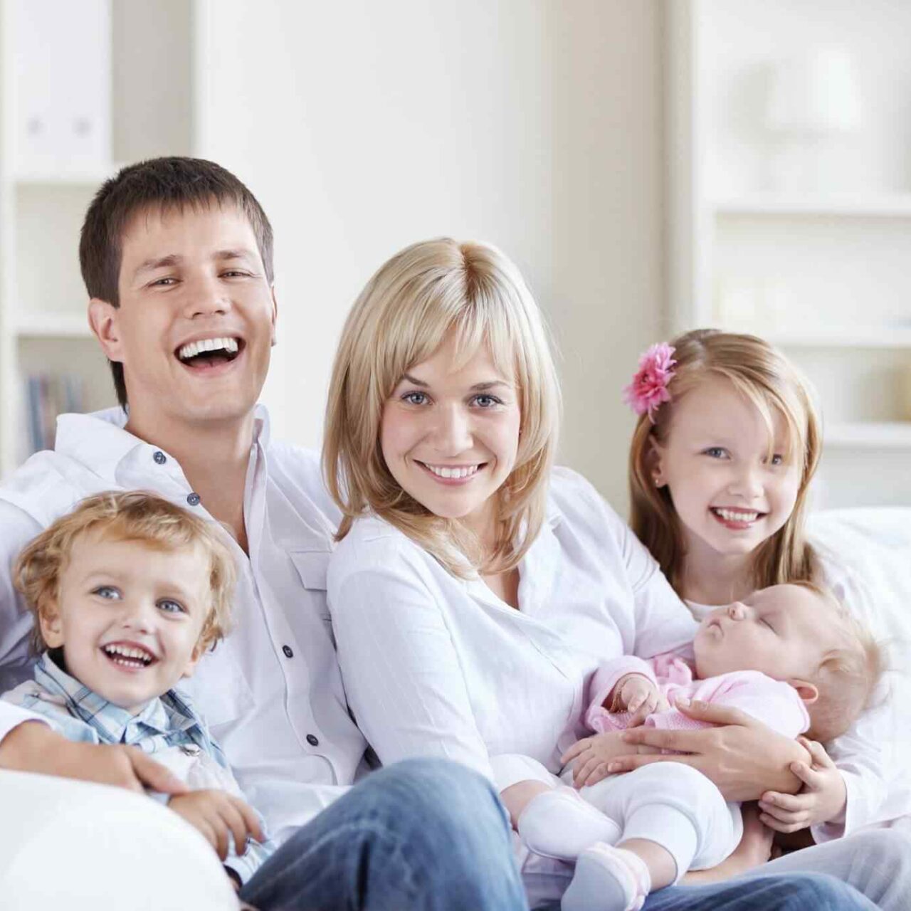 A happy family with three children at home